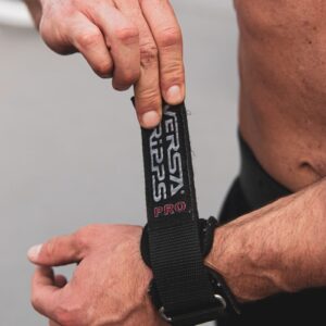 person holding black and white strap